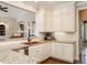 Bright kitchen with custom cabinets, granite countertops, and modern appliances at 3403 Raccoon Run Dr, Burlington, NC 27215