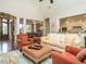 Bright living room featuring an open floor plan with views of the kitchen and front entryway at 3403 Raccoon Run Dr, Burlington, NC 27215