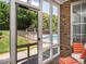 Relaxing screened patio with views of the pool and backyard at 3403 Raccoon Run Dr, Burlington, NC 27215