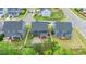 Aerial view of homes with screened in patios, fenced yards, and landscaping at 3678 Horton Hill Dr, New Hill, NC 27562