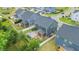 Aerial view of neighborhood showcasing fenced yards, screened porches, and stone patios at 3678 Horton Hill Dr, New Hill, NC 27562