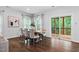 Charming dining room with hardwood floors and sliding glass doors to the deck at 3678 Horton Hill Dr, New Hill, NC 27562