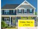 Charming two-story home with a well-manicured lawn, inviting curb appeal, and a welcoming front porch at 3678 Horton Hill Dr, New Hill, NC 27562