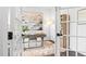 Stylish home office featuring hardwood floors, natural light, area rug, desk, and modern decor at 3678 Horton Hill Dr, New Hill, NC 27562