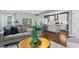 Elegant living room featuring hardwood floors, modern decor, and views into the kitchen at 3678 Horton Hill Dr, New Hill, NC 27562