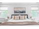 Comfortable bedroom showcases neutral decor, soft lighting, and a cozy atmosphere at 3678 Horton Hill Dr, New Hill, NC 27562