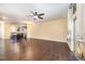 Spacious living area features hardwood floors, a ceiling fan, and abundant natural light throughout at 3945 Amelia Park Dr, Raleigh, NC 27606
