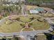 Aerial view of community park, walking paths, homes and community amenities including pool and tennis at 4 Seawell Ct, Durham, NC 27703