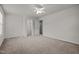 This bedroom features neutral carpeting and a walk in closet at 4 Seawell Ct, Durham, NC 27703