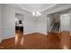 Formal dining room with hardwood floors, decorative molding, and adjacent to the kitchen and staircase at 4 Seawell Ct, Durham, NC 27703