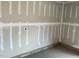 Unfinished garage interior with sealed concrete floors and sealed drywall, ready for customization at 4002 Silver Oak Ln, Durham, NC 27703