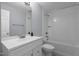 Bathroom featuring a white vanity, a toilet, and a shower/tub combo with a white curtain at 401 Haywood St, Raleigh, NC 27601