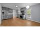 Spacious kitchen with modern stainless steel appliances, lots of storage, and wood-look flooring at 401 Haywood St, Raleigh, NC 27601