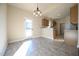 Bright dining area with access to back yard and view to the kitchen at 404 S Eastwood Dr, Benson, NC 27504