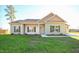 Charming one-story home with a well-maintained lawn and inviting entrance at 404 S Eastwood Dr, Benson, NC 27504