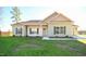 Charming one-story home with a well-maintained lawn and inviting entrance at 404 S Eastwood Dr, Benson, NC 27504