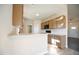 Kitchen with granite countertops, wood cabinetry, and stainless steel sink at 404 S Eastwood Dr, Benson, NC 27504
