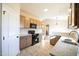 Bright, open kitchen showcases modern appliances, ample cabinets, and stone countertops at 404 S Eastwood Dr, Benson, NC 27504