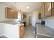 Modern kitchen featuring stainless steel appliances, and granite counters at 404 S Eastwood Dr, Benson, NC 27504