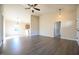 Spacious living room showing open floor plan to kitchen and high ceilings at 404 S Eastwood Dr, Benson, NC 27504