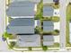 Aerial shot of homes with lush green yards, driveways, patios, and well-maintained roofs at 43 Quarter Gate Trce, Chapel Hill, NC 27516
