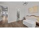 Cozy bedroom with sofa, open access to bathroom, and natural light, creating a relaxing atmosphere at 43 Quarter Gate Trce, Chapel Hill, NC 27516