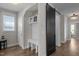 Convenient mud room area featuring custom storage, bench seating, and barn door detail at 43 Quarter Gate Trce, Chapel Hill, NC 27516