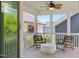 Relaxing screened porch with comfortable seating and an open view of the serene surroundings at 43 Quarter Gate Trce, Chapel Hill, NC 27516