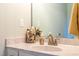 Elegant bathroom vanity with a marble countertop and decorative shell accents at 474 Pine Ridge Rd, Zebulon, NC 27597