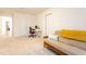 Carpeted room featuring a futon and a desk and chair, offering versatile living space at 474 Pine Ridge Rd, Zebulon, NC 27597