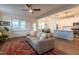 Open-concept living area showcasing a seamless flow into the kitchen and dining space at 474 Pine Ridge Rd, Zebulon, NC 27597