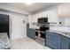 Well-lit kitchen features granite countertops, stainless steel appliances, and a subway tile backsplash at 504 High Ridge Dr, Durham, NC 27707