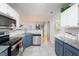 Efficient kitchen features stainless steel appliances, granite counters, and ample cabinet space at 504 High Ridge Dr, Durham, NC 27707