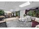 Bright basement with fireplace, media center and sliding doors to the backyard at 506 Burgess Rd, Apex, NC 27523
