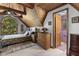 Charming bedroom with wood-paneled ceiling, arched window and ensuite bathroom access at 506 Burgess Rd, Apex, NC 27523