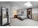 Comfortable bedroom with unique tile ceiling, built-in shelving, and plush carpeting at 506 Burgess Rd, Apex, NC 27523