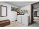 Well-lit laundry room equipped with modern washer and dryer units at 506 Burgess Rd, Apex, NC 27523