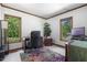 Home office provides a quiet workspace with natural light and ample room for productivity at 506 Burgess Rd, Apex, NC 27523