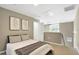 Relaxing bedroom with neutral tones, an upper loft and lots of natural light creates a comfortable living space at 506 N Mangum St # 402, Durham, NC 27701