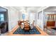 Inviting dining room with hardwood floors, classic décor, and plenty of natural light at 5728 Carriagehouse Ct, Apex, NC 27539