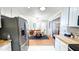 Open concept home with dining room connected to kitchen at 5728 Carriagehouse Ct, Apex, NC 27539
