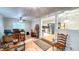 Home office with hardwood floors and access to the kitchen at 5728 Carriagehouse Ct, Apex, NC 27539