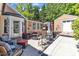 Outdoor living space with seating and a fire pit at 5909 Royal Coach Ct, Raleigh, NC 27612