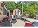 Beautiful backyard patio with seating and an outdoor shed, perfect for entertaining guests at 5909 Royal Coach Ct, Raleigh, NC 27612