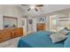 Bedroom with vaulted ceiling, carpet, and a view of the Primary bathroom at 5909 Royal Coach Ct, Raleigh, NC 27612