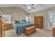 Bedroom with vaulted ceiling, carpet, and a door to the backyard at 5909 Royal Coach Ct, Raleigh, NC 27612
