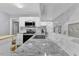 Kitchen with granite countertops, stainless appliances, and white subway tile backsplash at 5909 Royal Coach Ct, Raleigh, NC 27612