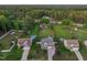 Expansive aerial view of a home with a large lot, complemented by mature trees at 60 Consella Way, Franklinton, NC 27525
