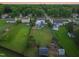 Overhead aerial view of home with inground pool, hot tub, and sprawling green backyard at 60 Consella Way, Franklinton, NC 27525