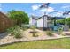 Backyard oasis featuring a fire pit, lush cactus garden, and a charming outdoor bar, perfect for relaxation at 60 Consella Way, Franklinton, NC 27525